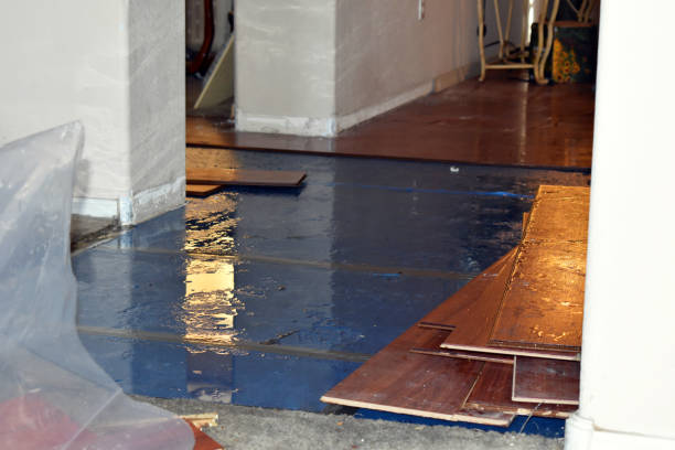 Professional Flood Damage Restoration technician working in Barnstead, NH